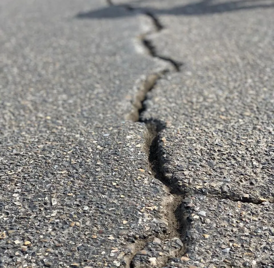 Before image of a crack on the road — Edinburg, TX — Lone Star Asphalt Services LLC