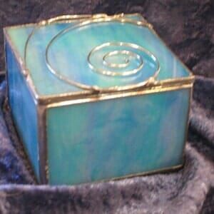 A blue box with a spiral design on it