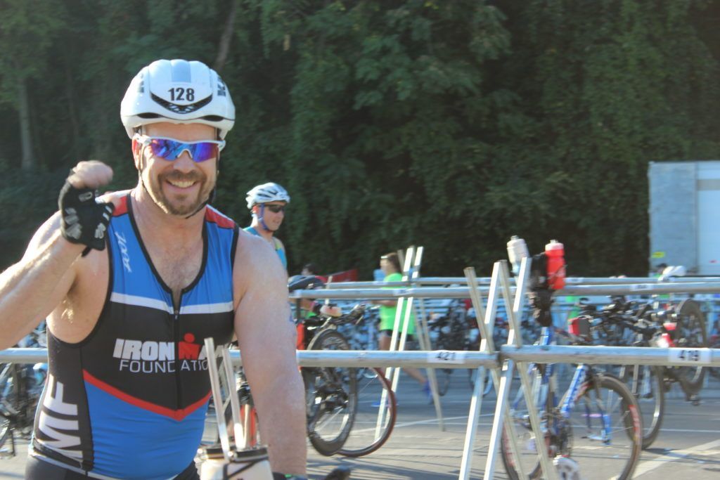 TEAM IMF Athlete, Nelson Robinson, is all smiles before the 114 mile bike ride- he had a great swim.