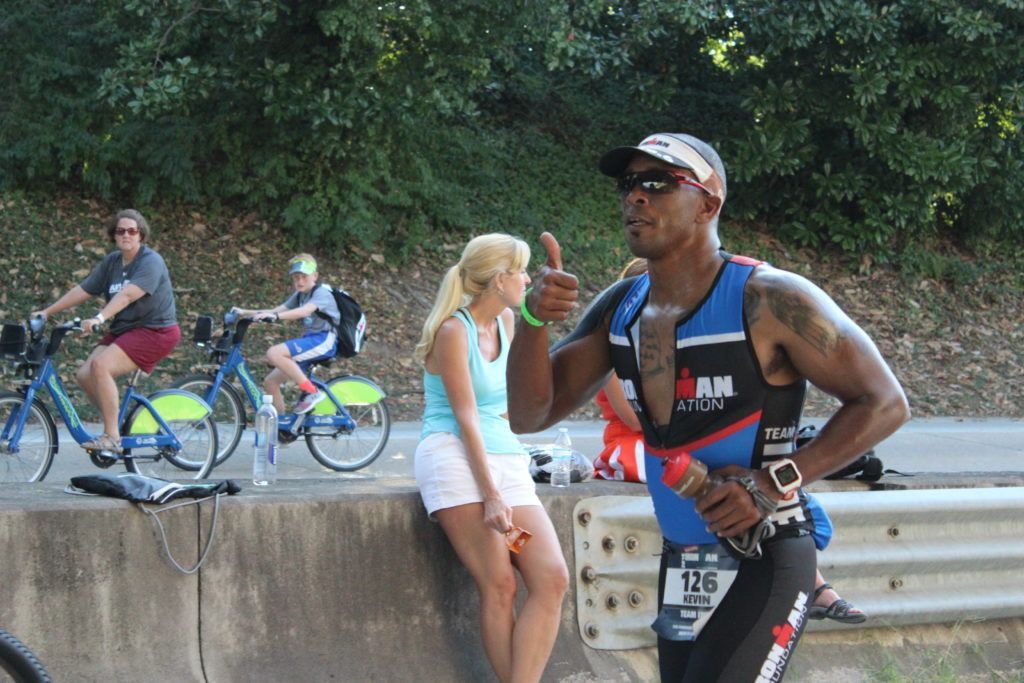 TEAM IMF Athlete, Kevin Edmonds, gives a thumbs up during one of the longest uphill portions of the run. Staying strong!