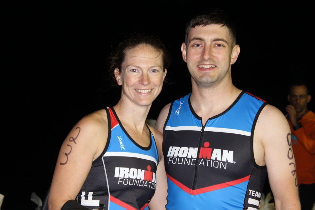 TEAM IMF Ambassadors, Alicia Golden and Matt Conso, in transition before the swim.