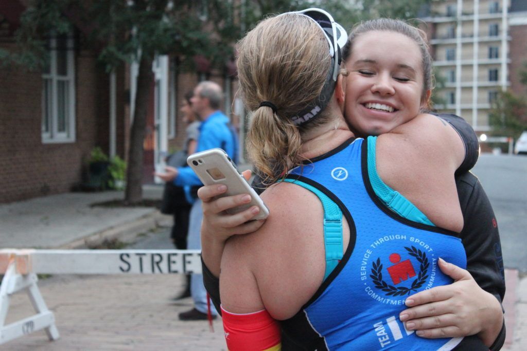 TEAM IMF Athlete, Tara Daley, gets a hug from her daughter Camryn to give her a boost on a tough day.
