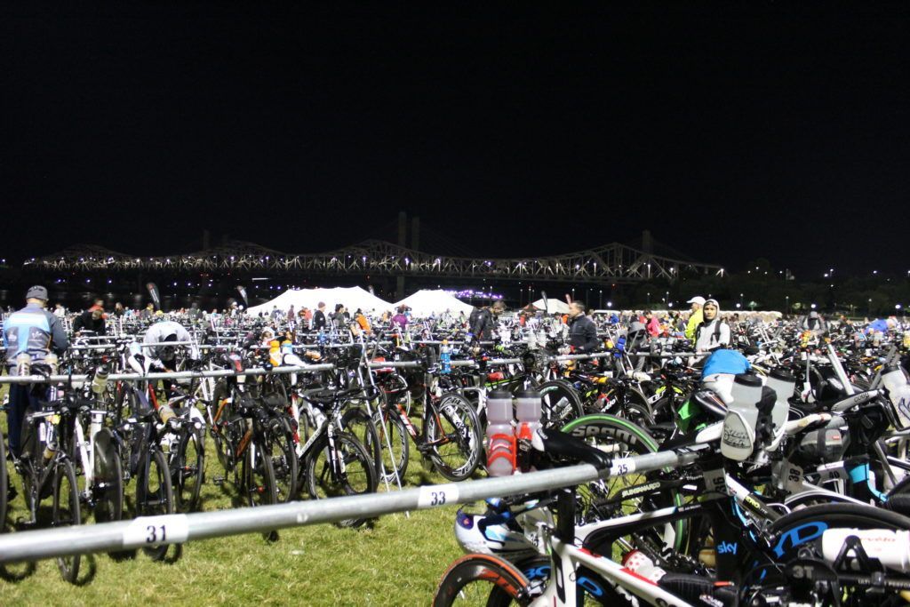 It's race morning and our guys are ready to go- TEAM IMF Athletes are at the swim start, and we are waiting for them here in transition.