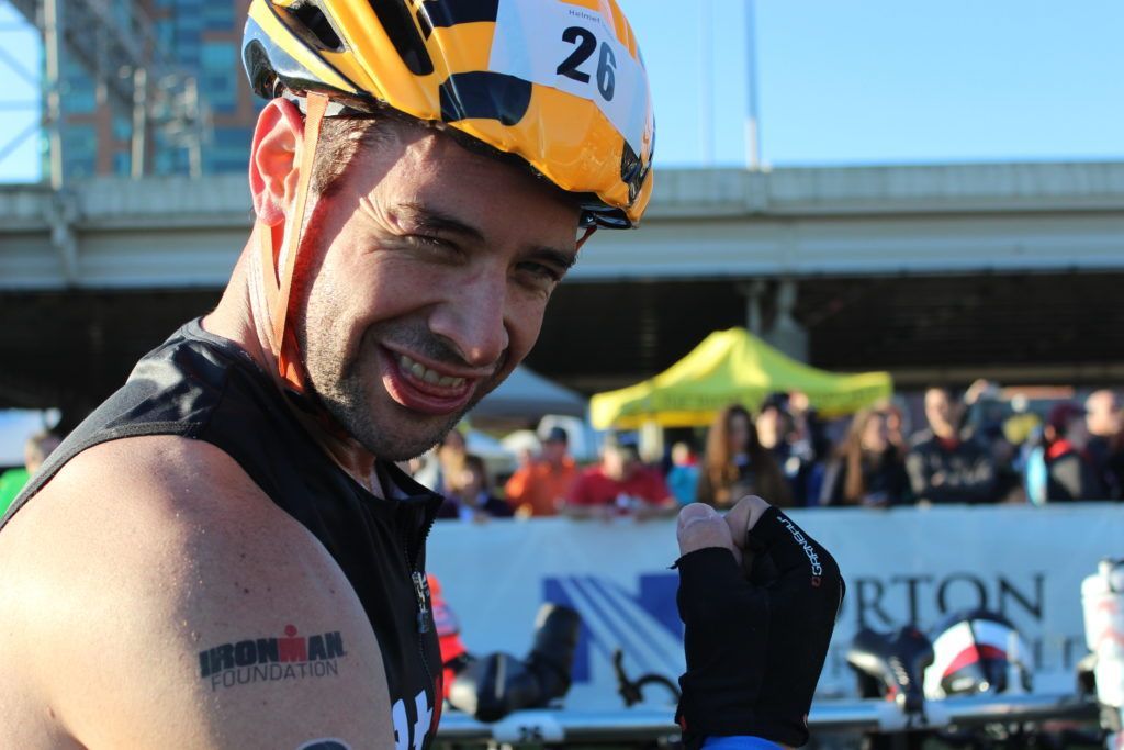 TEAM IMF Athlete, Pete Wenger, shows off his guns (and his IMF tattoo) in T1.