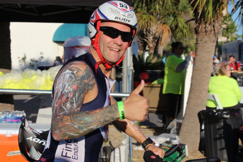 IRONMAN First-timer, and TEAM IMF Athlete, Tim Stamm, is pumped to see all of his hard training transfer into an awesome race day!