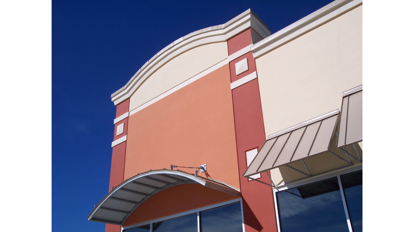 Multi-story commercial building with a finished stucco exterior facade in Flagstaff, AZ