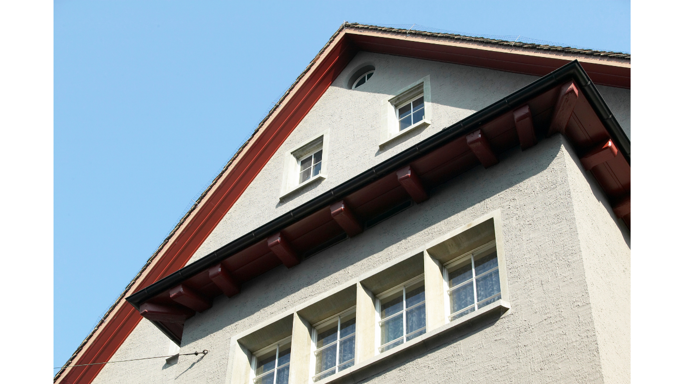 Cottage home with stucco exterior
