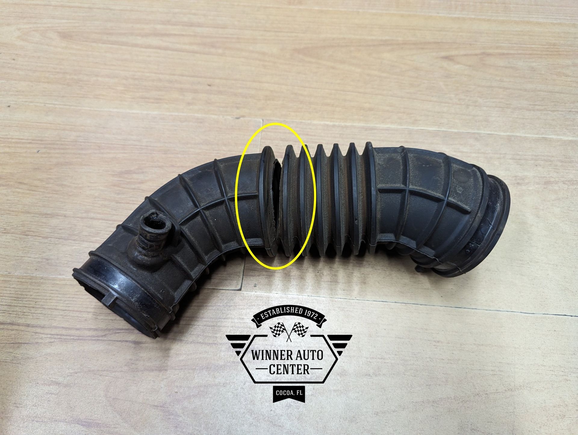 Black rubber air intake hose | Winner Auto Center