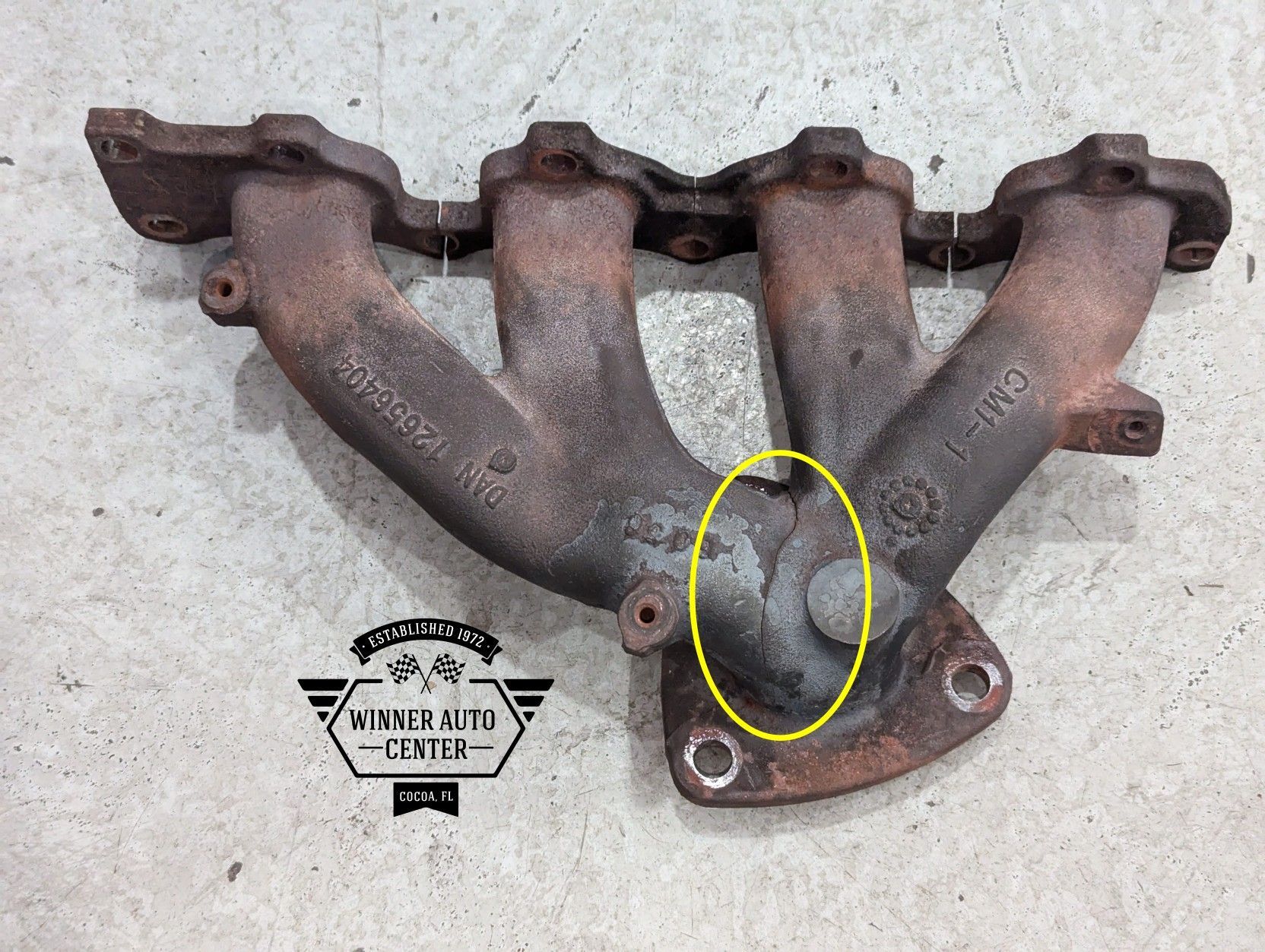 A rusty metal exhaust manifold | Winner Auto Center