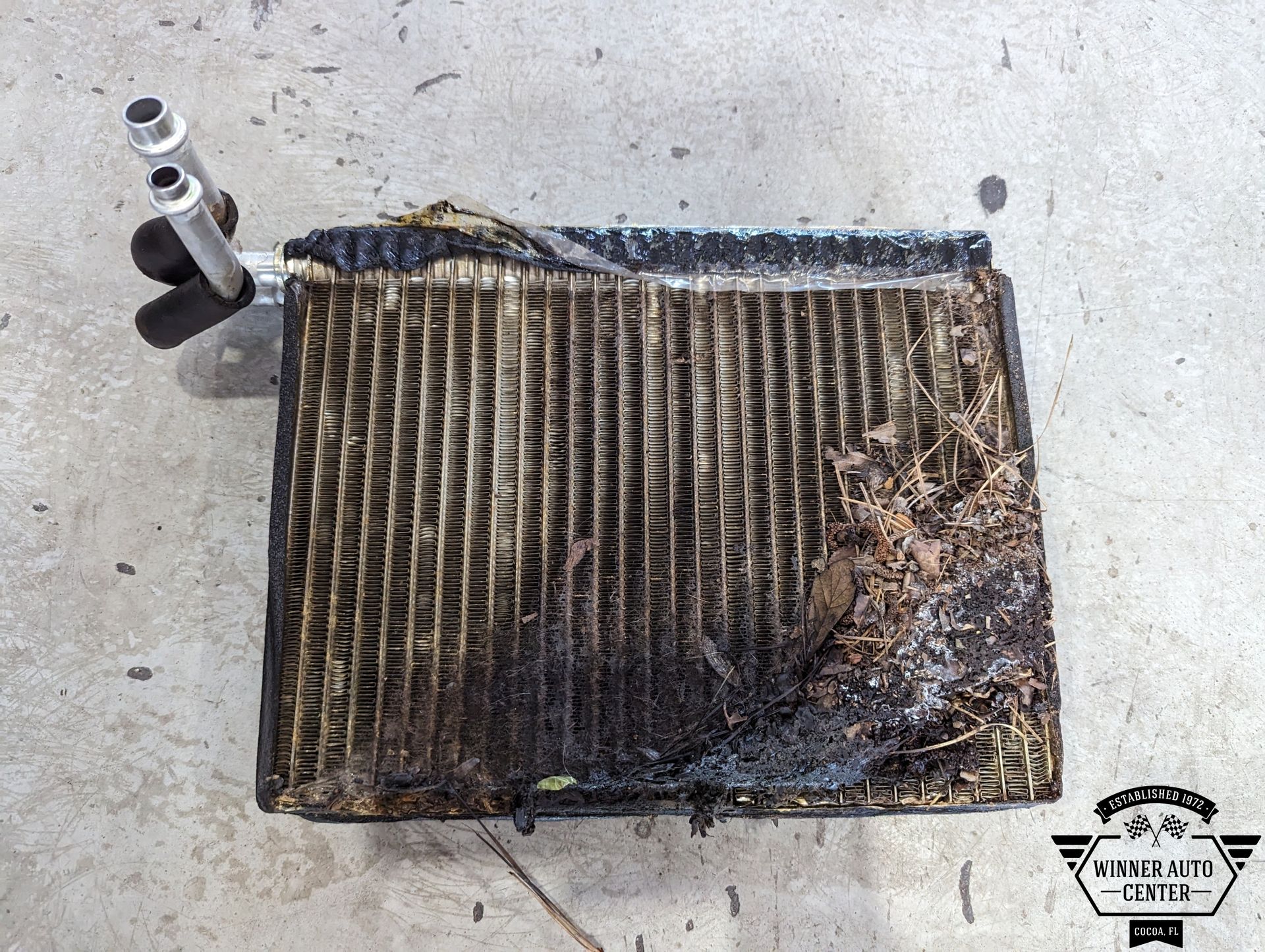 A damaged car air conditioning evaporator core | Winner Auto Center