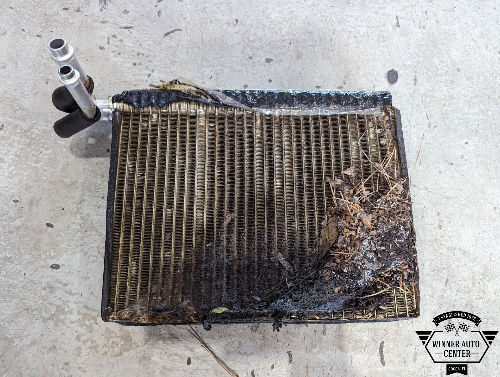 A damaged car air conditioning evaporator core | Winner Auto Center