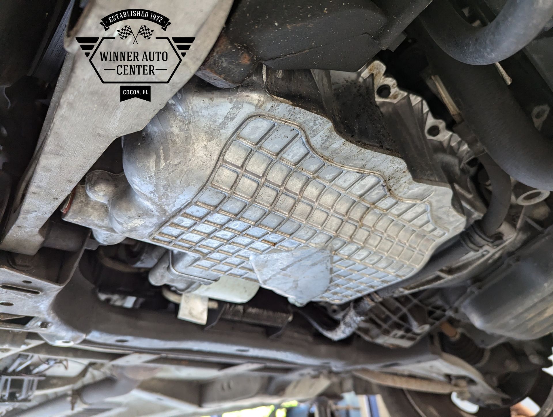 Underside of a vehicle, showing the oil pan | Winner Auto Center
