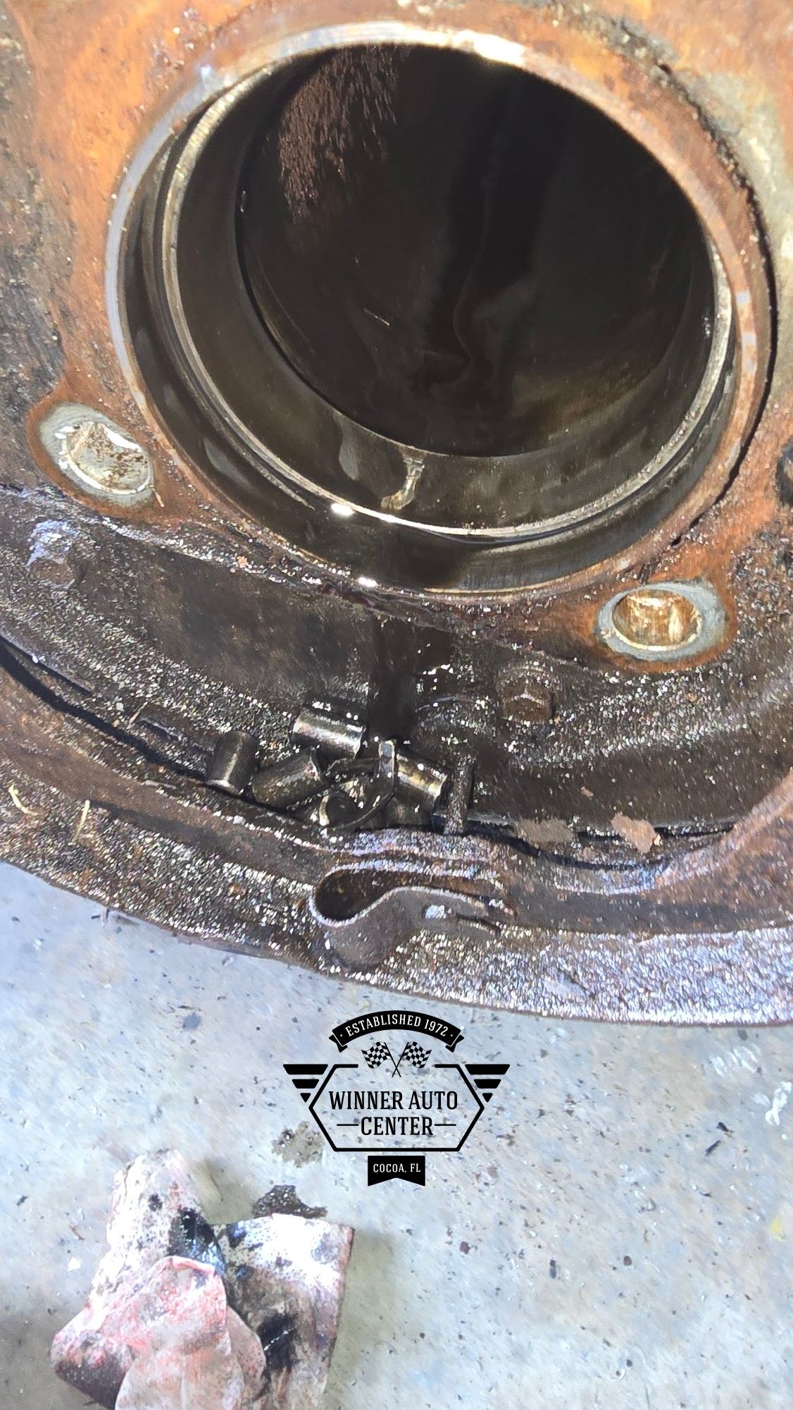 Close-up view of a rusty vehicle drum brake assembly | Winner Auto Center