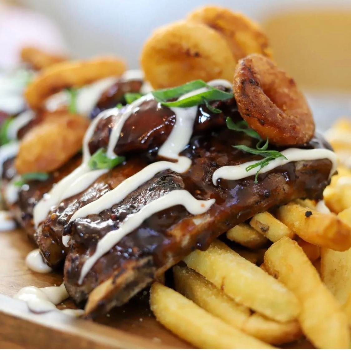 Slow cooked ribs with chips — Hart & Soul Bar and Grill in Toukley, NSW
