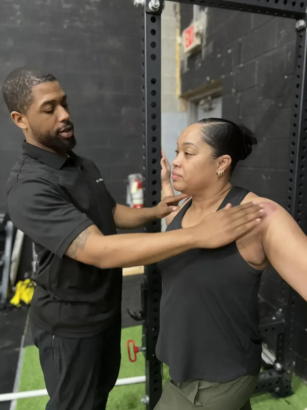 Personal trainer working with athletes