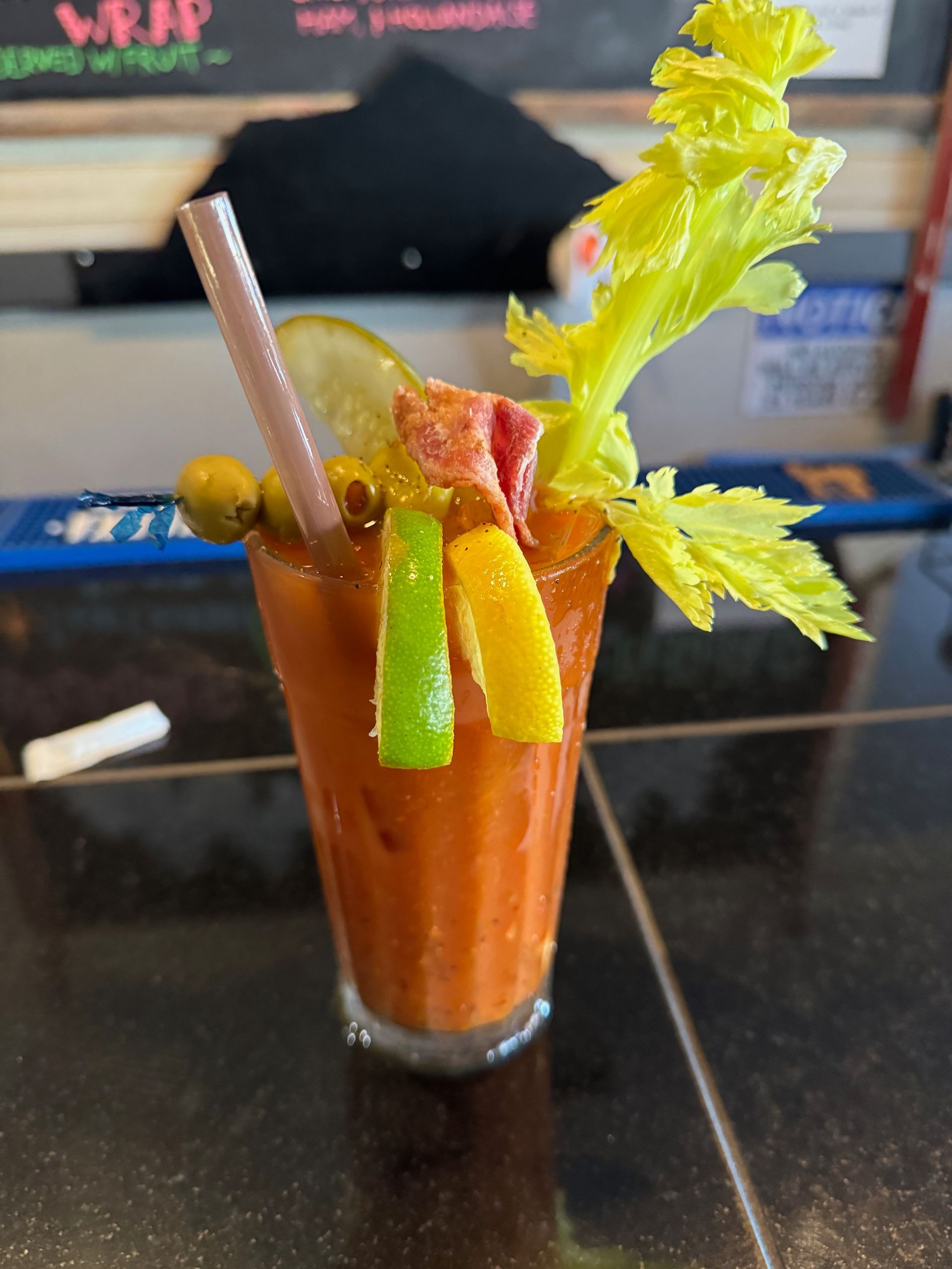 a bloody mary on a bar