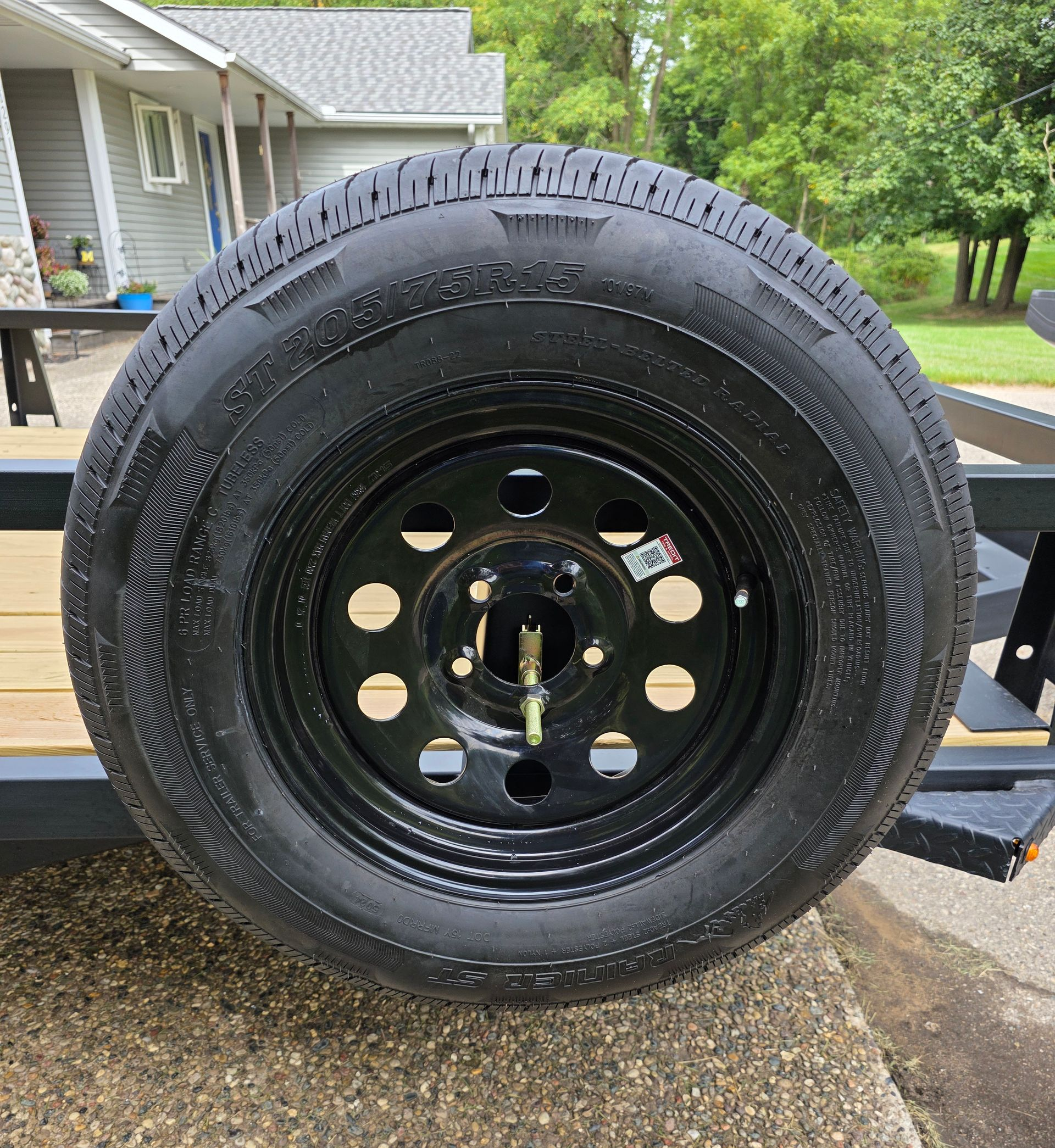 steel utility trailer spare tire mounted