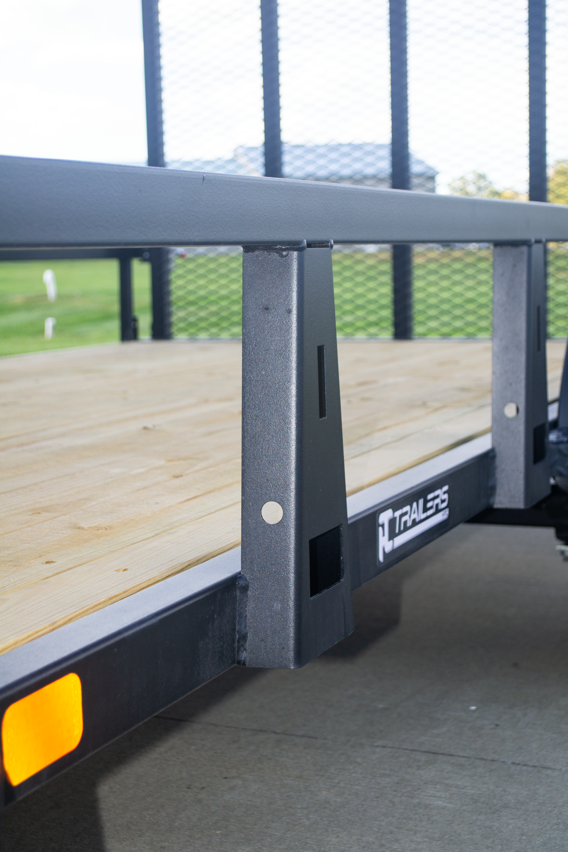 Multi anchor upright bracket on steel utility trailer