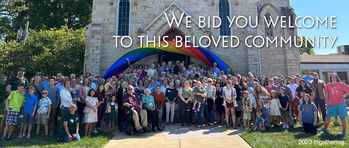 Eliot Chapel Congregation gathered in front of the church on a sunny day