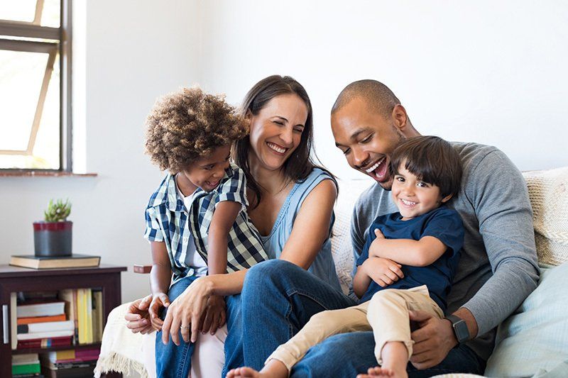 Family Having Fun at Home — Greenacres FL — Roy-Roth Agency