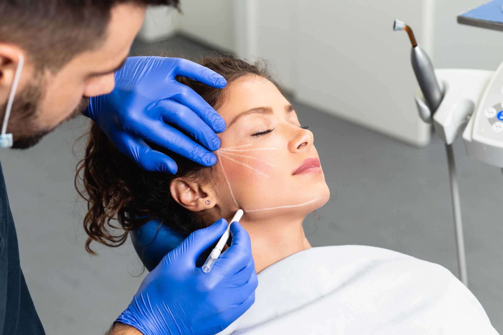 female patient having a plastic surgery consultation