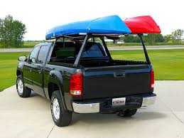Kayaks in a Rack on a Top of a Truck