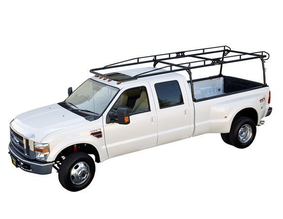 White Truck with a Ladder Rack on the Roof
