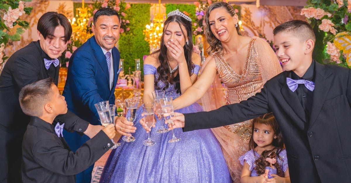 A group of people are toasting a girl in a purple dress at a quinceanera party.