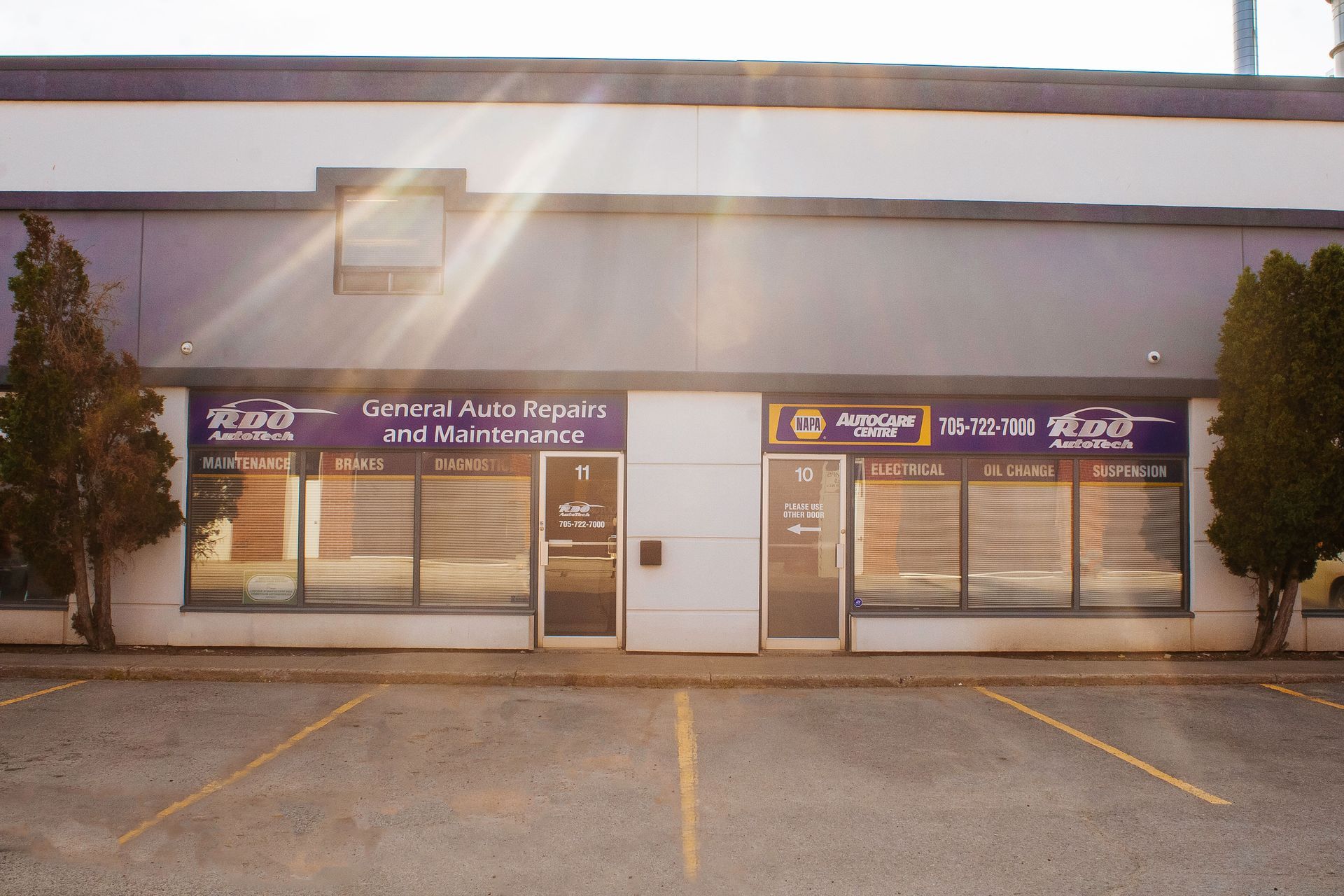A business with blue and orange signage, 