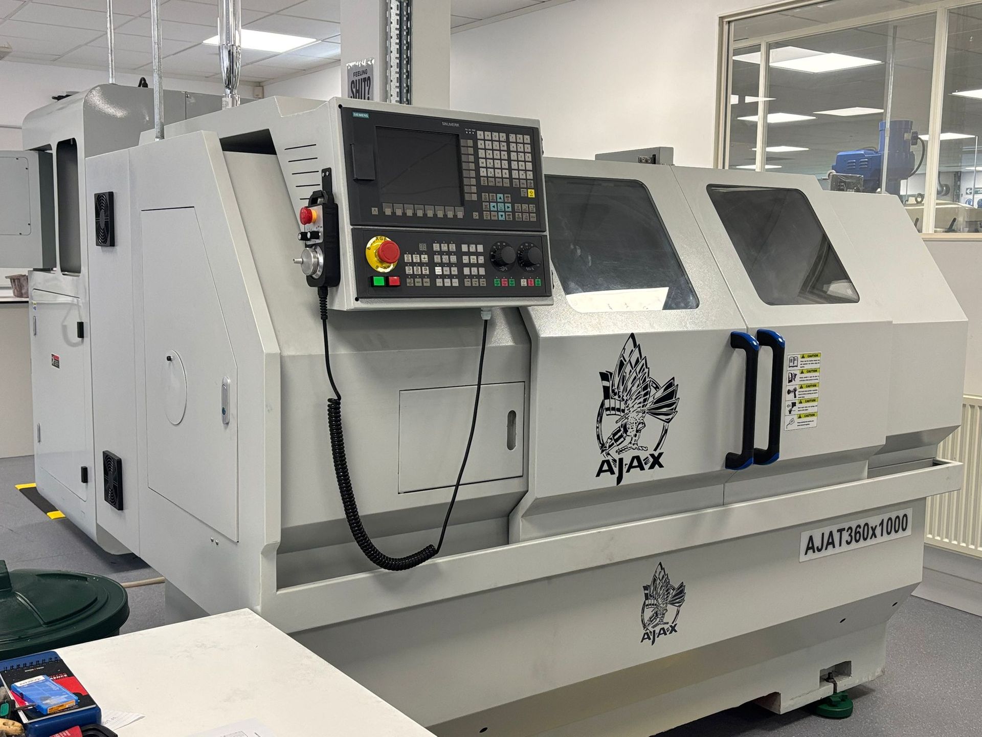 A large machine is sitting in a factory.