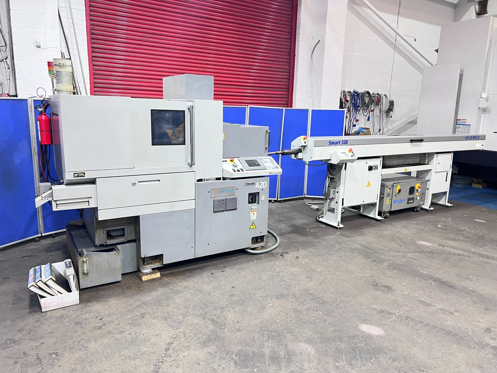 A large machine is sitting in a factory.