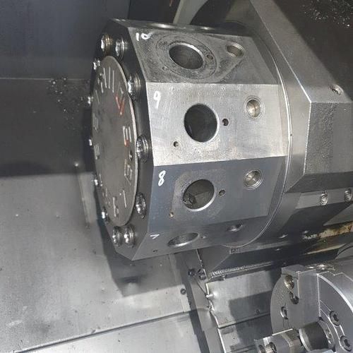 A close up of a machine with a clock on it.