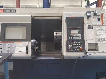 A machine is sitting on a table in a factory.