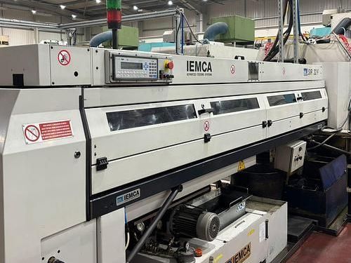 A large machine is sitting in a factory.