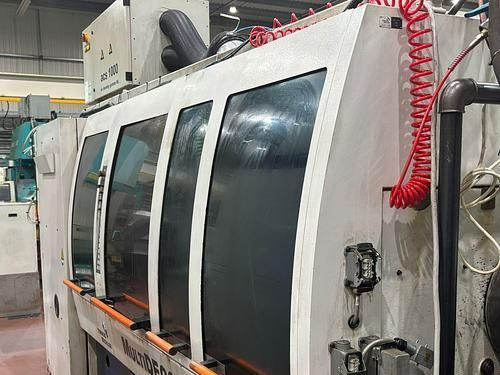 A large machine is sitting in a factory.