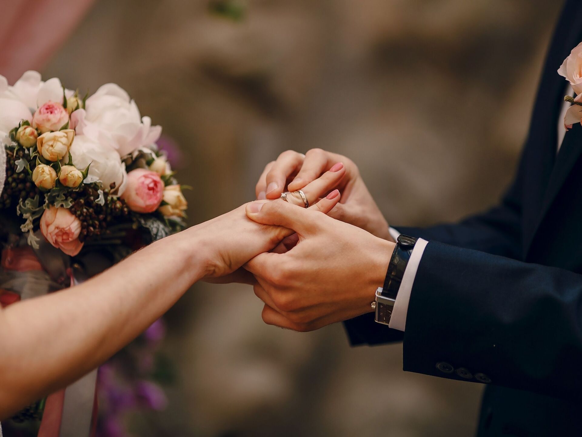 Wedding ring put on finger