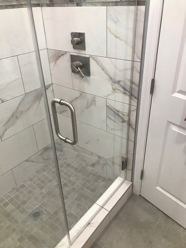 Bathroom Design — Bathroom with Clear Glass Door Side View in La Habra, CA