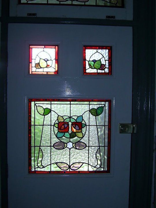 door with three small leadlight shining through
