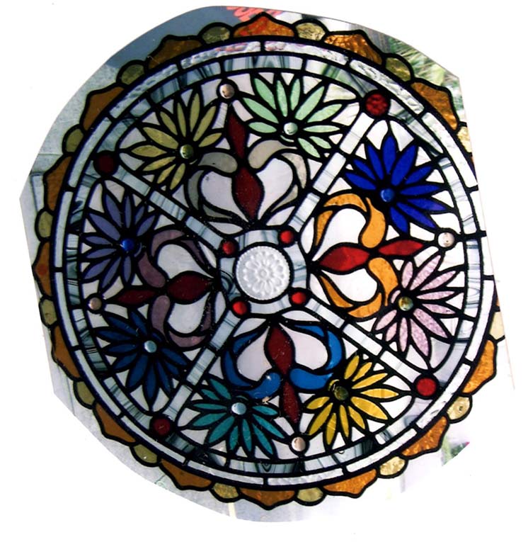 circular leadlight design with many colors and flowers