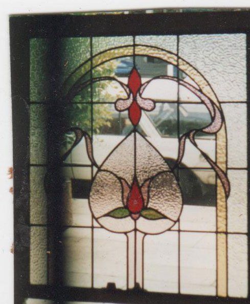 clear window with a leadlight design in the middle and sides