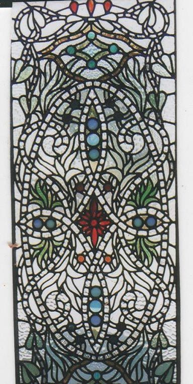 very intricate leadlight window with a red flower in the middle.