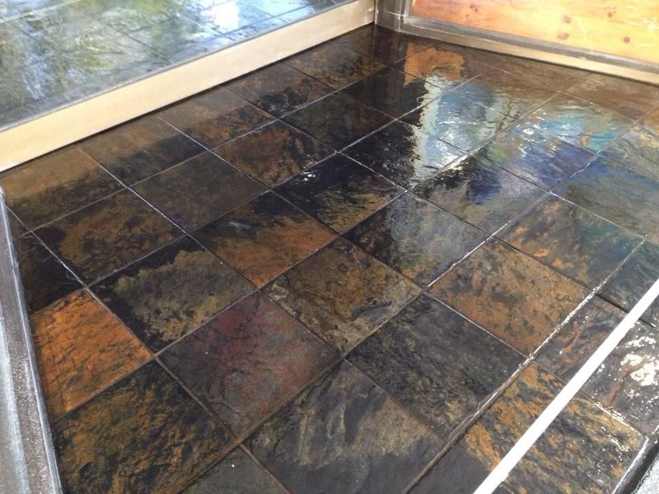 Slate Tile Floor, Wet, With Copper and Black Tones — Ultimate Restoration Services in Koongal, QLD