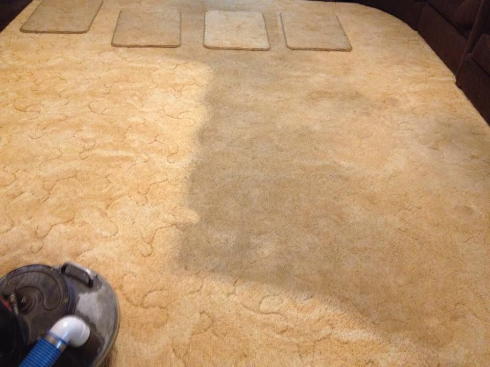 Carpet Being Cleaned With a Machine. Half of Carpet is Clean — Ultimate Restoration Services in Koongal, QLD