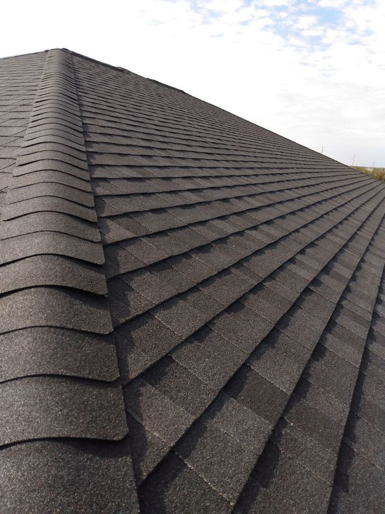 A close up of a roof with shingles on it