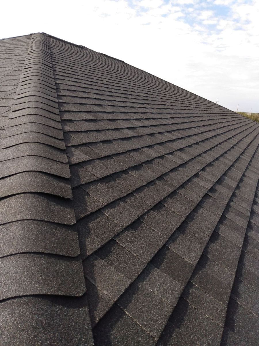 A close up of a roof with shingles on it