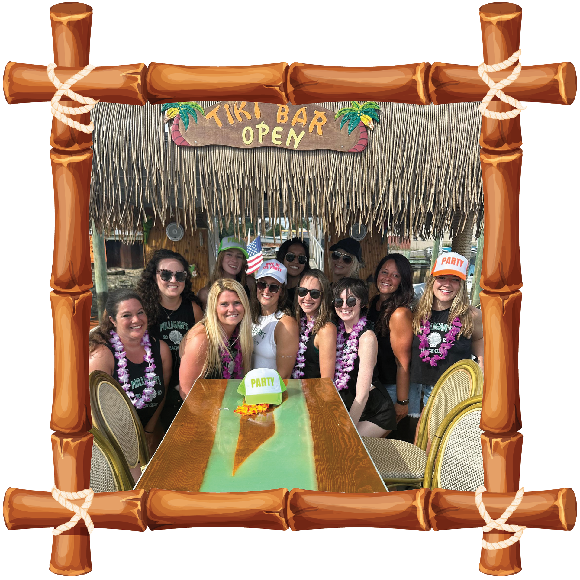 Group posing under a tiki bar sign in a bamboo-themed photo frame, with leis and hats around a miniature golf lane.