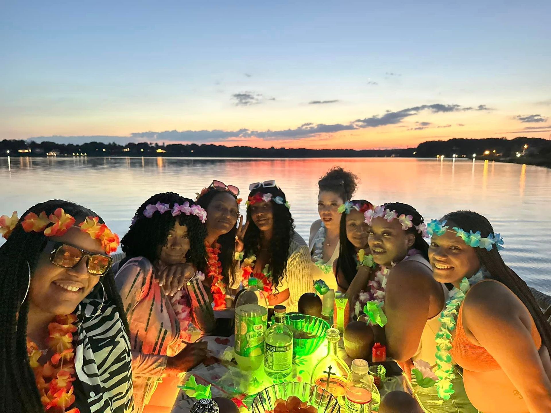 group of friends on ohana tiki boat