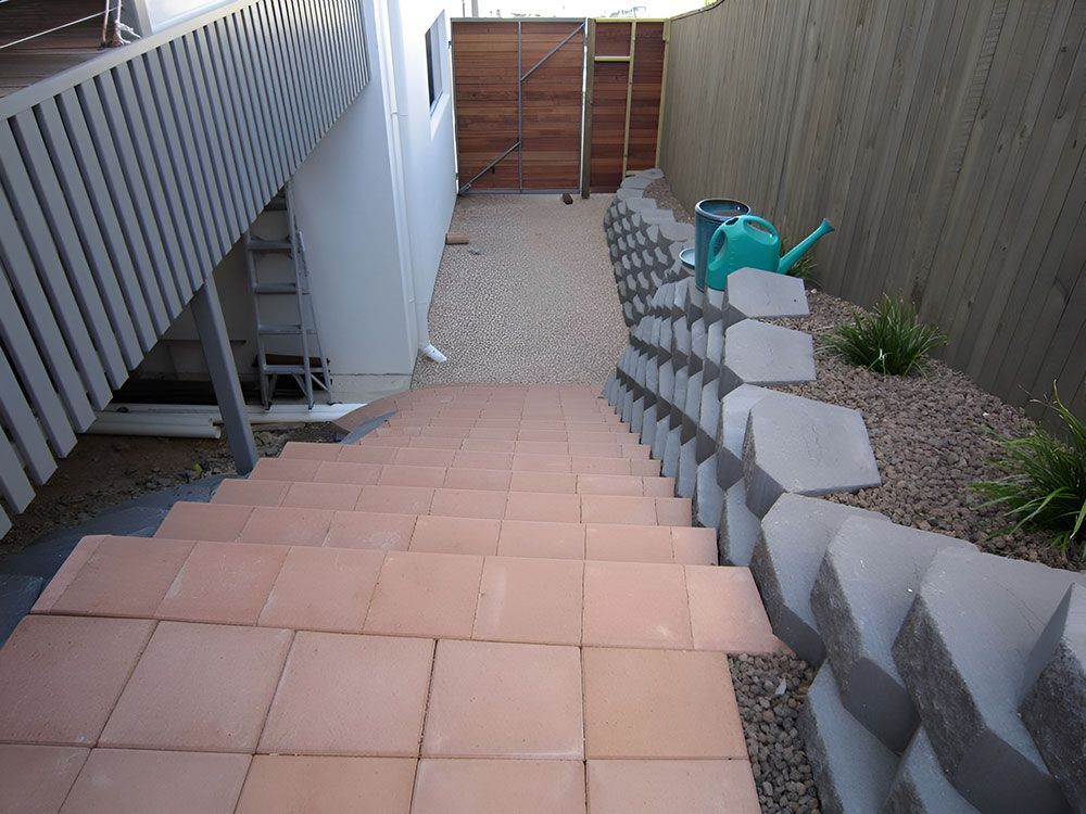 Staircase Accompanied by a Retaining Wall — Austen Landscaping & Earthmoving in Ayr, QLD