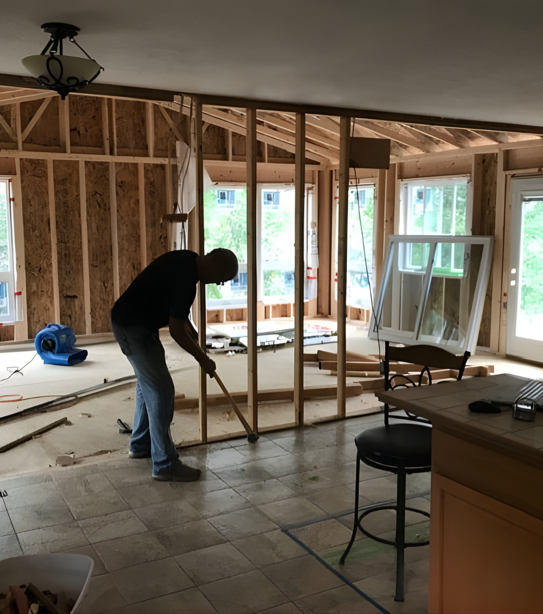 Empty room with shelves. Gray carpet, beige walls, white shelves.