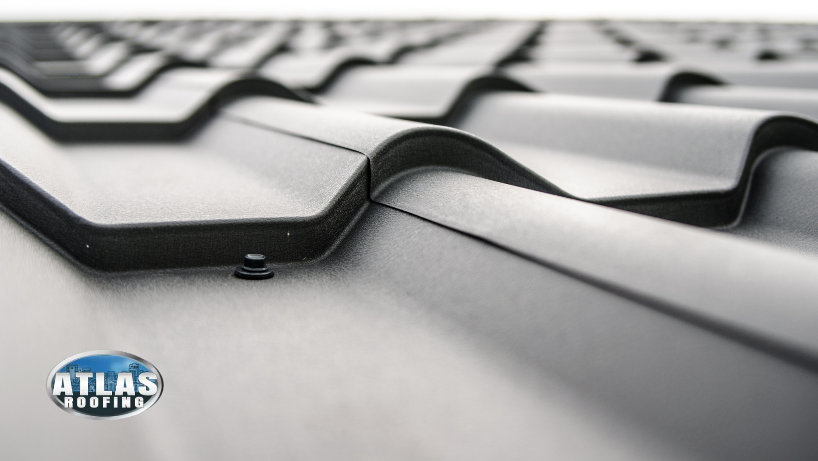 A close up of a roof with a logo for atlas roofing